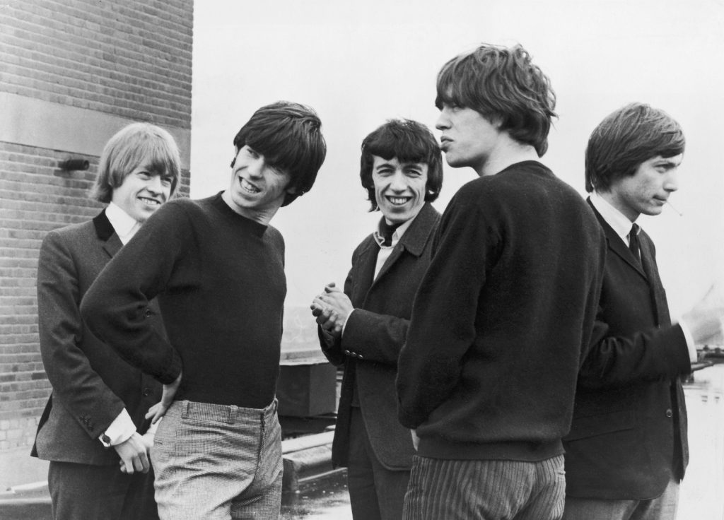 The Rolling Stones on a rooftop, 17th June 1964. Left to right: Brian Jones (1942 - 1969), Keith Richards, Bill Wyman, Mick Jagger and Charlie Watts. (Photo by Archive Photos/Getty Images)